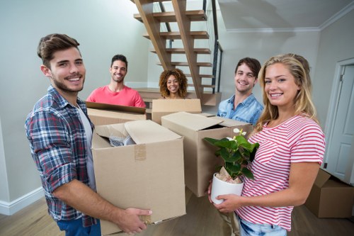 Happy family after a successful move with removalists