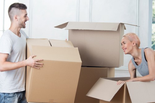 Removalists packing belongings carefully for a move