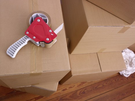 Office furniture being packed for relocation